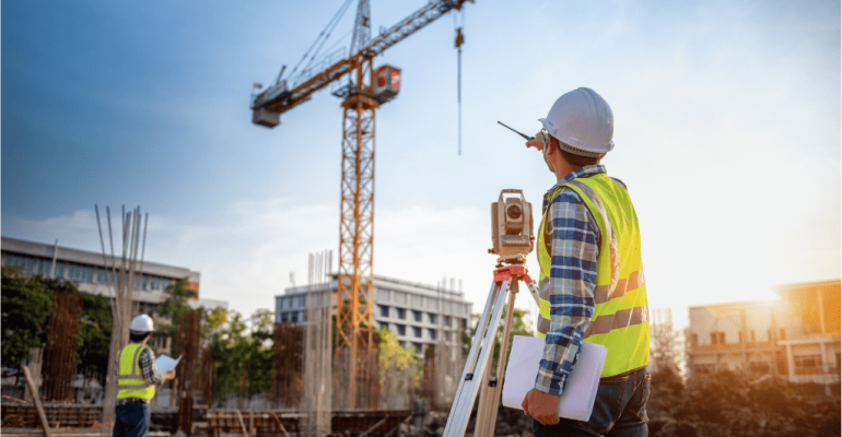 A surveying manager at a construction site