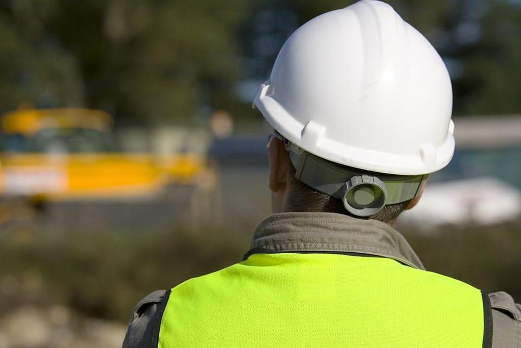 A construction surveying manager at a job site.