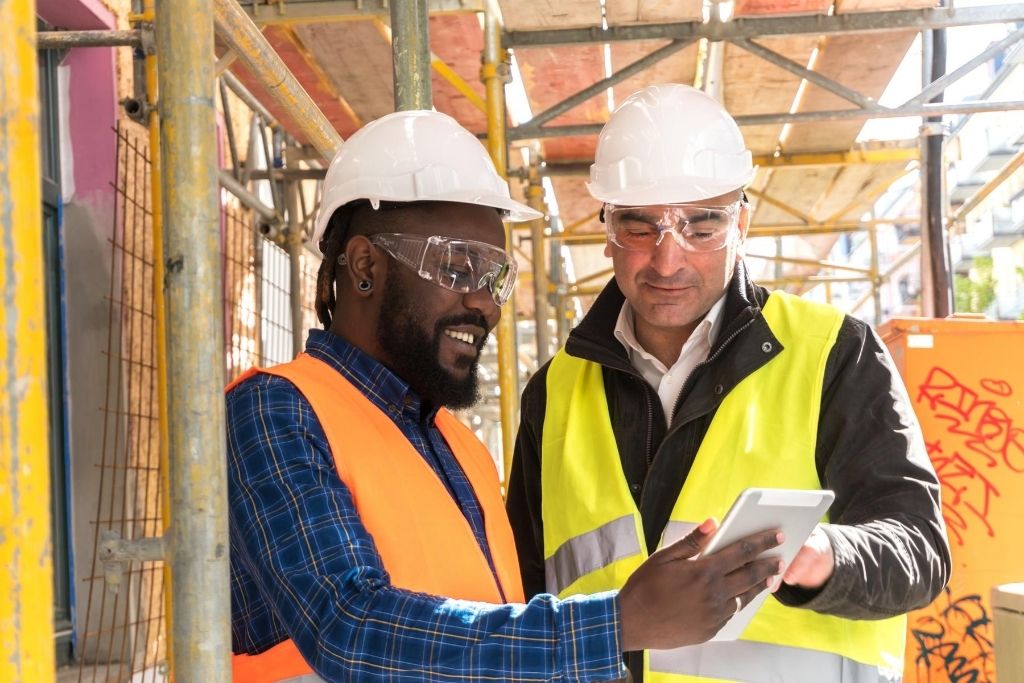 Two construction managers discussing work