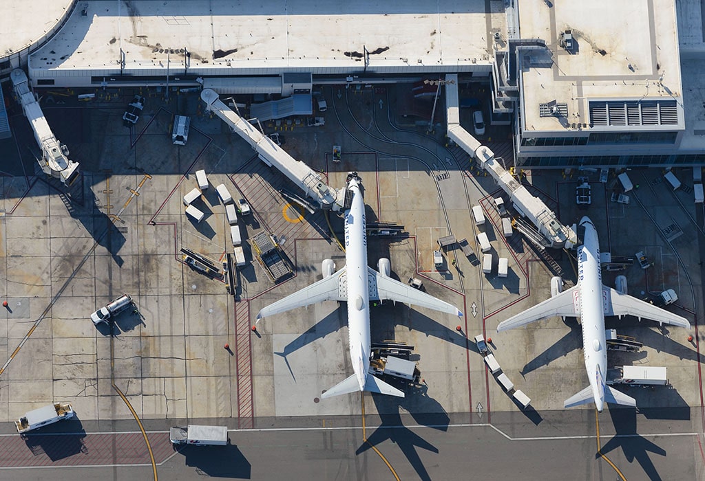 Airplanes at a terminal of an airport.