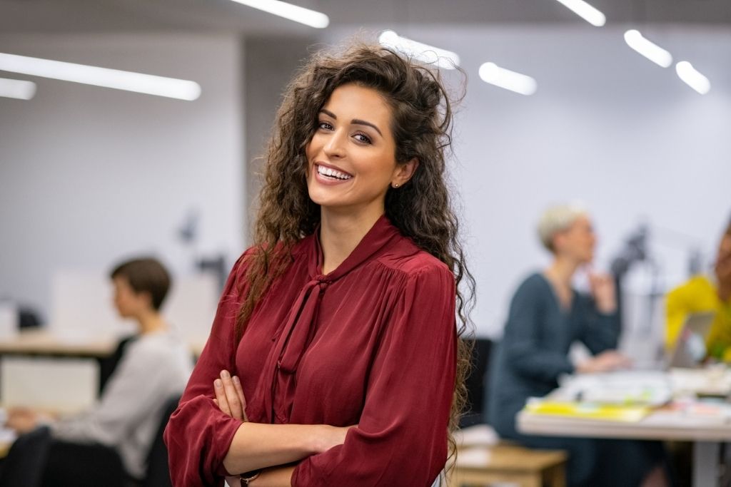 Businesswoman smiling in office