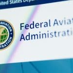 Close-up of the Federal Aviation Administration website header with the FAA seal and U.S. DOT banner