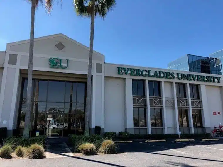 Everglades University Tampa campus entrance with palm trees
